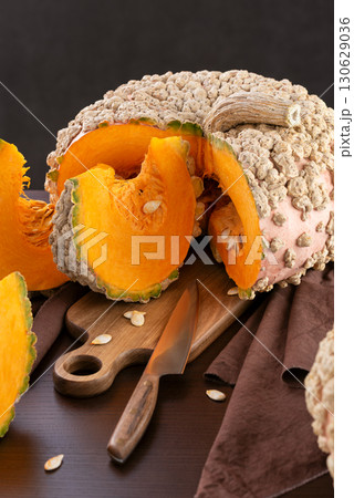 Peanut pumpkin Galeuse d Eysines And Wedges Prepared On Kitchen Table Peanut pumpkin Galeuse d Eysines And Wedges Prepared On Kitchen Table 130629036