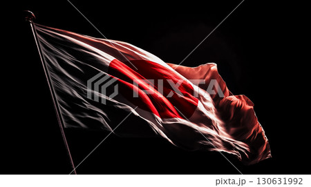 黒い背景に力強くたなびく日本国旗 130631992