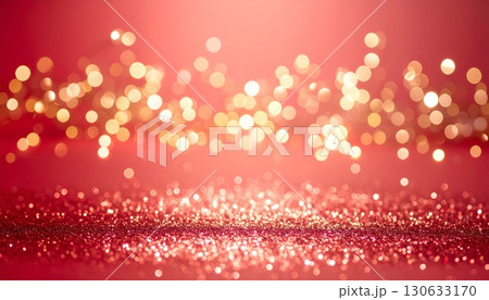 クリスマスやバレンタインに使える高級感あるピンクの背景に輝くゴールドの光とキラキラグリッター 130633170