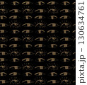 Seamless vector pattern with green and brown eyes on black background for creative design projects 130634761