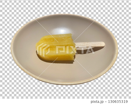 Yellow Popsicle on White Plate with Natural Light, isolated transparent background 130635319