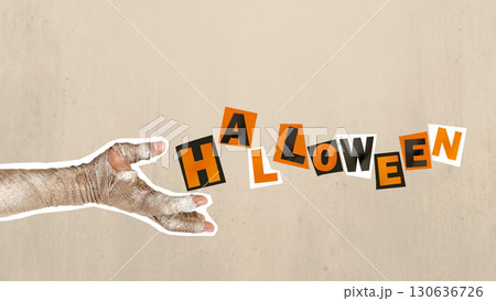 Mummy hand with dirty bandages on them showing text of Halloween on a colored background. Mummy, devil, evil, satan, or zombie hand. Collage art of Halloween Mummy hand with dirty bandages on them showing text of Halloween on a colored background. Mummy, devil, evil, satan, or zombie hand. Collage art of Halloween 130636726