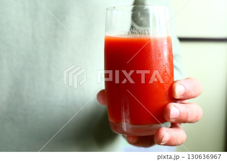 Glass of fresh tomato juice 130636967