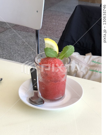 Refreshing watermelon slushies made with juicy, sweet watermelon blended to icy perfection, offering a perfect burst of fruity coolness and vibrant summer flavor in every thirst-quenching sip. 130638746