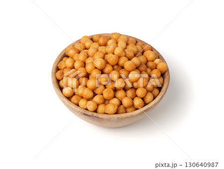 Small pastry balls, fried crispy wheat soup pearls, salad egg puffs or choux pastry Small pastry balls, fried crispy wheat soup pearls, salad egg puffs or choux pastry 130640987