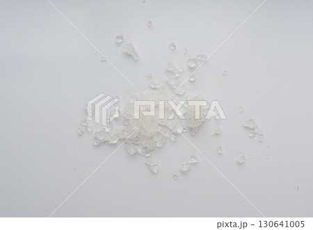 Dead sea salt pile, white crystals for body spa, sodium chloride similar to crushed ice, spa scrub 130641005