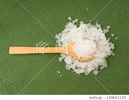 Dead sea salt pile, white crystals for body spa, sodium chloride similar to crushed ice, spa scrub 130641220