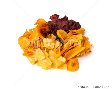 Parsnips, sweet potato, carrot and beetroot chips isolated, dry vegetable root mix, healthy snacks 130641282