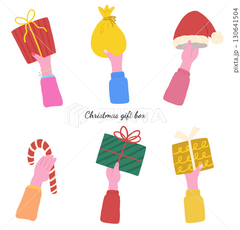 手に持ったクリスマスプレゼント、かわいい手描きイラストセット 130641504