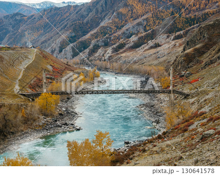 Ininsky suspension bridge is bridge over Katun River on Chuisky Tract highway. Ininsky Bridge is suspension bridge over Katun near Inya village Ongudai district, Altai Republic, architectural landmark 130641578