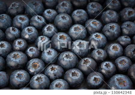 Blueberry texture background. Fresh blue berry fruits pattern, bilberry wallpaper with copy space 130642348