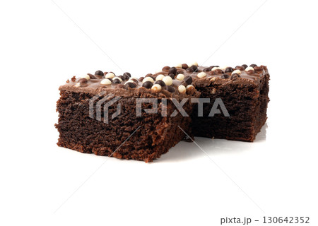 Chocolate brownie cake sprinkled with white and dark balls, classic birthday brownie square piece Chocolate brownie cake sprinkled with white and dark balls, classic birthday brownie square piece 130642352