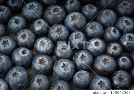 Blueberry texture background. Fresh blue berry fruits pattern, bilberry wallpaper with copy space 130642505