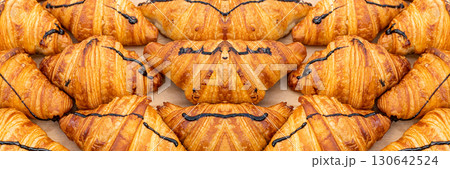 Mini croissant pattern. French puff pastries, chocolat bakery Mini croissant pattern. French puff pastries, chocolat bakery 130642524
