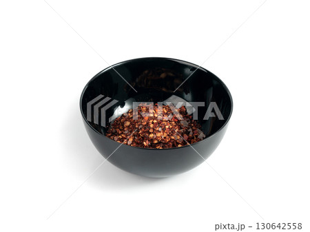 Chili and salt seasoning, red chilli pepper spice powder, dry crushed hot pepper flakes 130642558