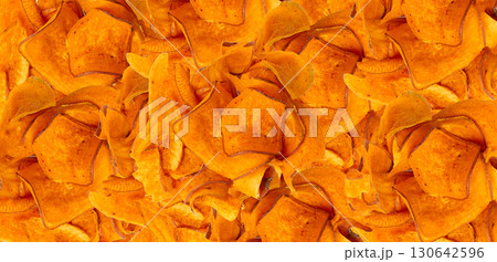 Dry sweet potato chips pattern, dried sliced red vegetable wallpaper, orange Ipomoea batatas 130642596