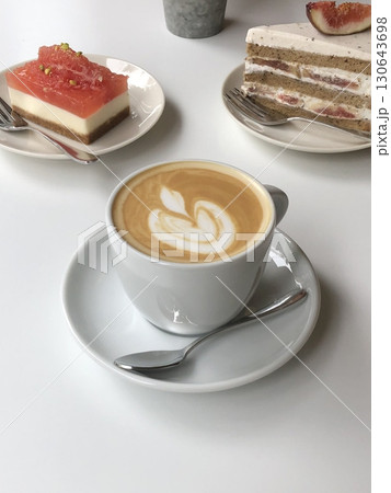 Light and creamy desserts with delicate layers, fresh fruits, and rich flavors, paired with refreshing sweet drinks. A perfect cafe treat for a delightful and indulgent experience. Light and creamy desserts with delicate layers, fresh fruits, and rich flavors, paired with refreshing sweet drinks. A perfect cafe treat for a delightful and indulgent experience. 130643698
