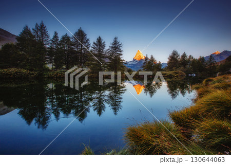 Great panorama with famous peak Matterhorn. Location place Swiss alps, Grindjisee, Europe. Beauty world. Great panorama with famous peak Matterhorn. Location place Swiss alps, Grindjisee, Europe. Beauty world. 130644063