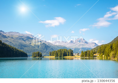 Great view of the azure pond Champfer. Location Swiss alps, Silvaplana village, district of Maloja, Europe. Great view of the azure pond Champfer. Location Swiss alps, Silvaplana village, district of Maloja, Europe. 130644356