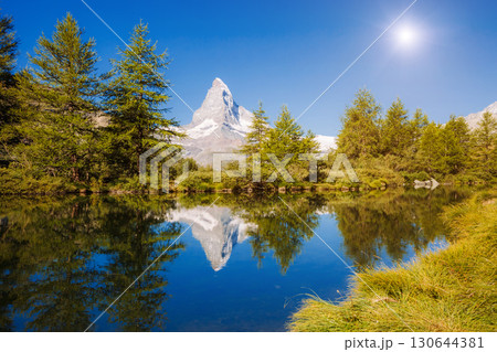 Great panorama with famous peak Matterhorn. Location place Swiss alps, Grindjisee, Europe. Beauty world. Great panorama with famous peak Matterhorn. Location place Swiss alps, Grindjisee, Europe. Beauty world. 130644381