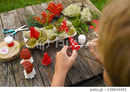Fall craft project with natural and recycled ingredients, illustrating a mushroom. Fall craft project with natural and recycled ingredients, illustrating a mushroom. 130644491