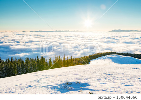 View of the misty valley. Location Carpathian, Ukraine, Europe. 130644660