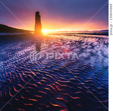 Spectacular black sand after the tide. Location place Hvitserkur rock, Vatnsnes peninsula, Iceland, Europe. 130644989