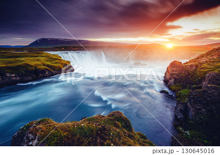 The rapid flow of water powerful Godafoss cascade. Location place Skjalfandafljot river, Iceland, Europe. 130645016
