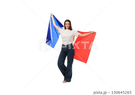 Celebration with a woman showcasing a flag, isolated on white, PNG 130645265