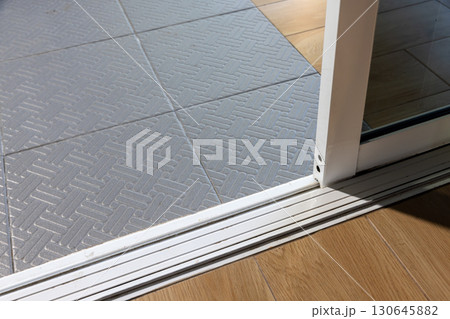 Dust on sliding door sills and bottom tracks ,  these areas need cleaning. 130645882