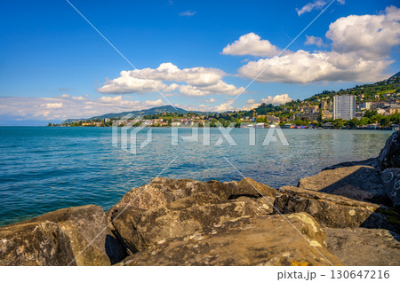 Montreux, Switzerland, with hillside buildings and Lake Geneva 130647216
