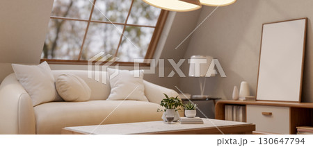 Fabric sofa with cushion and table under warm lamp light in living room or study room. Cosy Interior Fabric sofa with cushion and table under warm lamp light in living room or study room. Cosy Interior 130647794