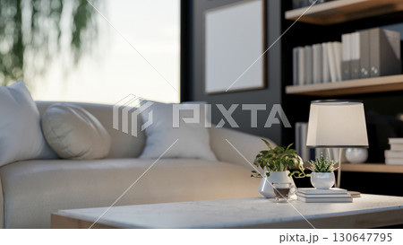 A large fabric sofa with cushion and square marble table in living room or study room. Cosy Interior 130647795