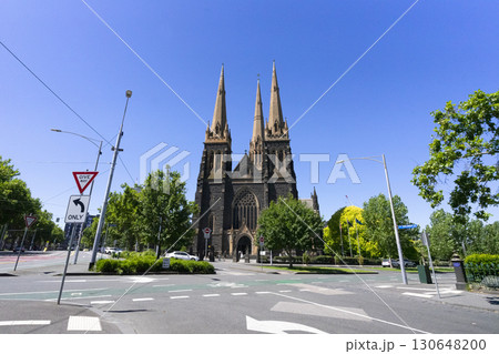 Melbourne, Australia - December 29,2023 : Historical St. Patrick's Cathedral with blue sky in Melbourne, Australia on December 29,2023. Melbourne, Australia - December 29,2023 : Historical St. Patrick's Cathedral with blue sky in Melbourne, Australia on December 29,2023. 130648200