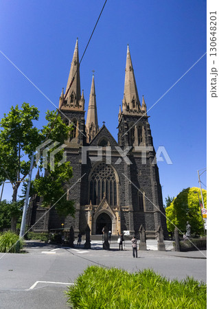 Melbourne, Australia - December 29,2023 : Historical St. Patrick's Cathedral with blue sky in Melbourne, Australia on December 29,2023. Melbourne, Australia - December 29,2023 : Historical St. Patrick's Cathedral with blue sky in Melbourne, Australia on December 29,2023. 130648201