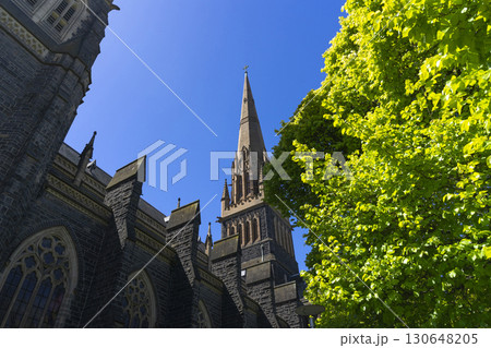 Melbourne, Australia - December 29,2023 : Historical St. Patrick's Cathedral with blue sky in Melbourne, Australia on December 29,2023. Melbourne, Australia - December 29,2023 : Historical St. Patrick's Cathedral with blue sky in Melbourne, Australia on December 29,2023. 130648205