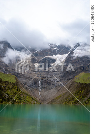 Emerald waters of Laguna Humantay surrounded by Andean mountains in Peru 130648400