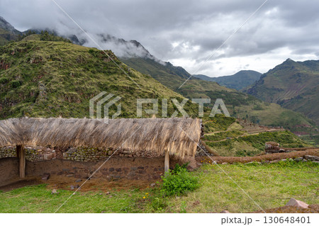 Ancient Inca ruins of Pisac nestled in the Andean mountains, Peru 130648401