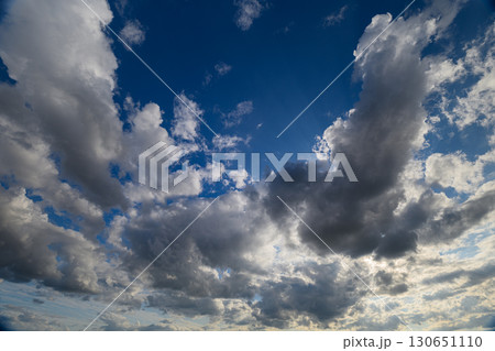 A Dramatic Cloudscape with Varied Textures and Colors Captivating the Viewers Imagination A Dramatic Cloudscape with Varied Textures and Colors Captivating the Viewers Imagination 130651110