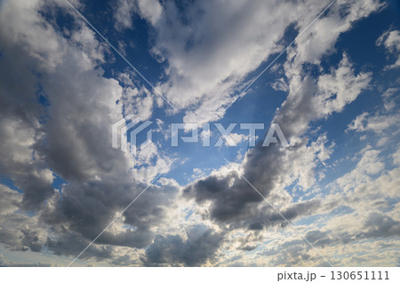 A Beautiful Cloudscape Under a Clear Blue Sky, Breathtaking and Full of Vibrant Color 130651111