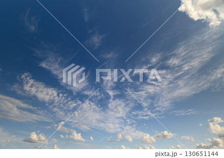 A Gorgeous and Beautiful Blue Sky Is Adorned with Soft and Wispy Clouds Up Above Us 130651144