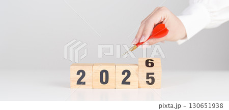 red dart with  chess people and 2026 year blocks.. Goal, plan, action, target, strategy, leadership, New Year and marketing concept 130651938