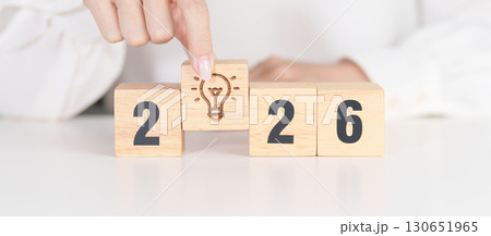 2026 year block with lightbulb. Business Idea, Creative, Thinking, brainstorm, Goal, Resolution, strategy, plan, Action, change and New Year start concepts 130651965