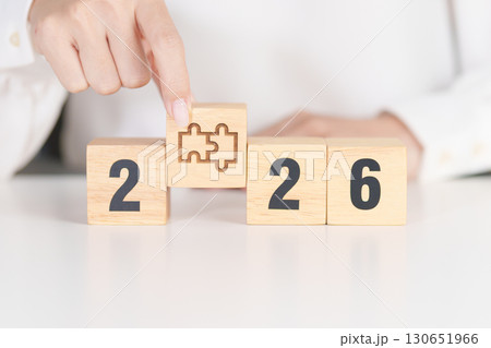 2026 year block with jigsaw puzzle icon. Business Process, Team, teamwork, Goal, mission, Resolution, strategy, plan, Action, partnership, and New Year start 130651966