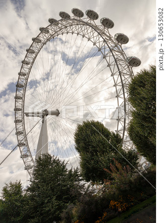 The prominently features the London Eye also known as the Millennium Wheel, is a prominent iconic cantilevered observation wheel. 130653082