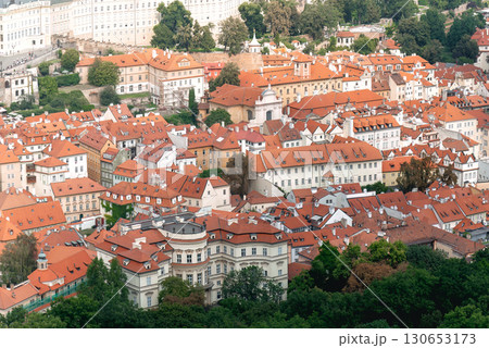 Capturing the unique architecture of Prague from above, showcasing the city's red roofs and lush greenery, Czech Republic 130653173