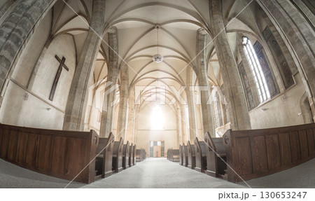 Sunlight is shining through stained glass windows in an empty Emmaus Monastery in Prague, Czech Republic 130653247