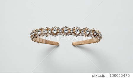 Jeweled headband isolated on white background, crystal accessory, close-up, sparkling details 130653470