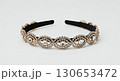 Jeweled headband isolated on white background, crystal accessory, close-up, sparkling details 130653472