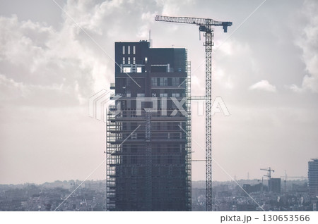 Modern skyscraper is being built in an urban city center of Limassol, Cyprus Modern skyscraper is being built in an urban city center of Limassol, Cyprus 130653566